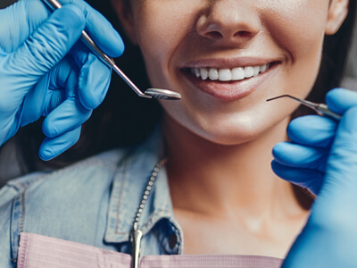 Woman In Dental Clinic